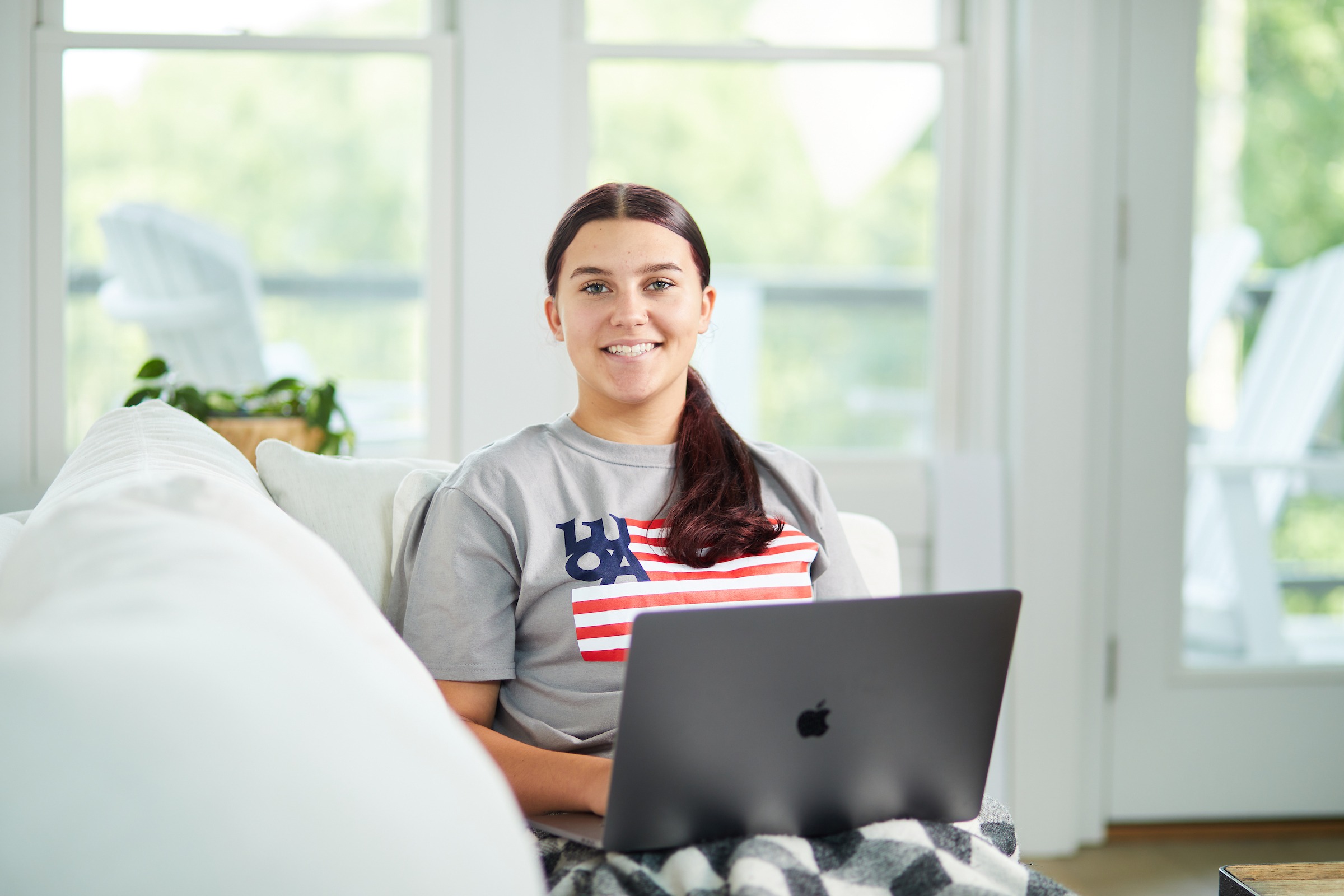 LUOA Dual enrollment student on laptop