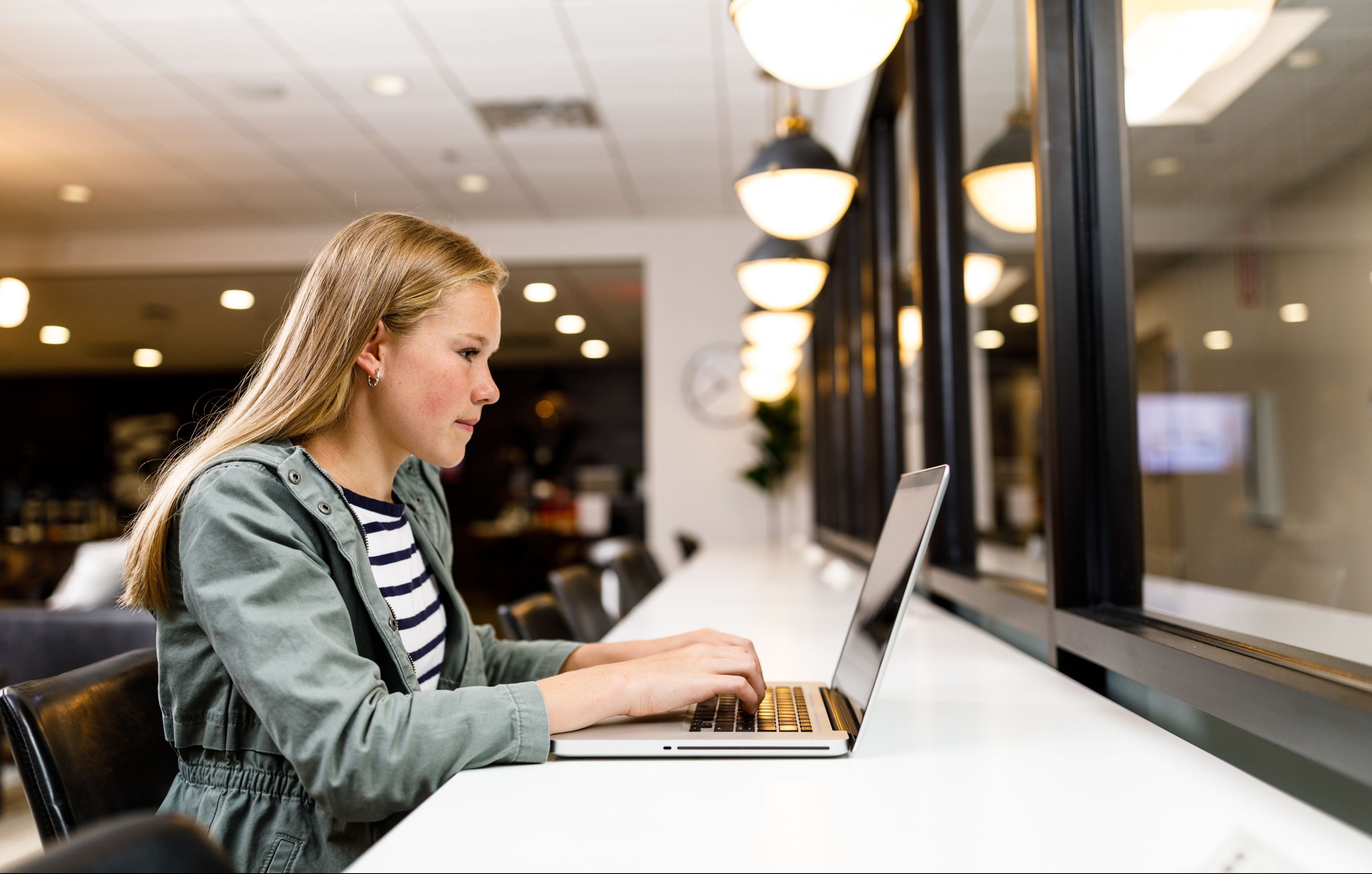 Liberty University Online Academic Calendar, Student On Computer