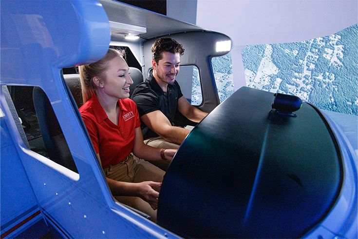 Students in flight simulator